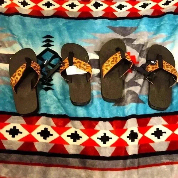 Bioworld Shoes - Leopard print BIOWORLD thong sandals.